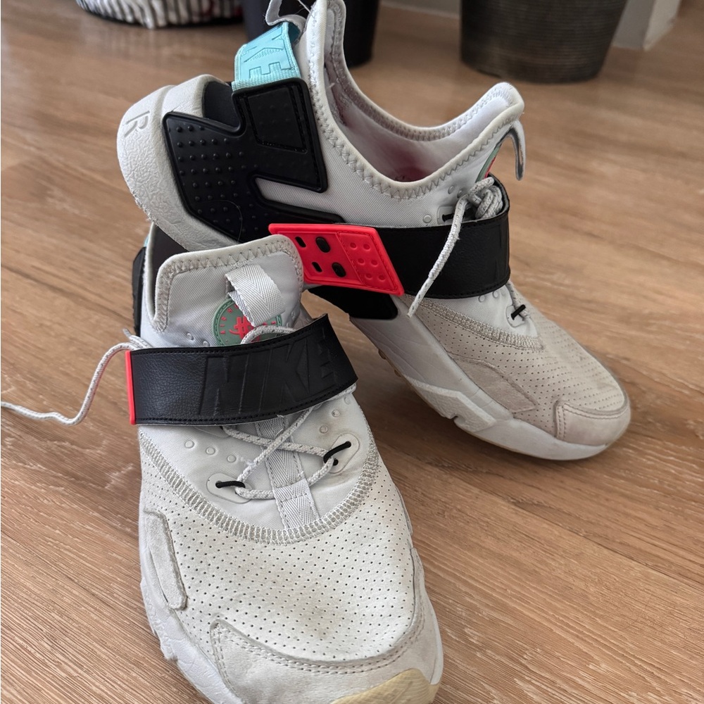 Nike men’s White and Black Sneakers with Red and blue Accents